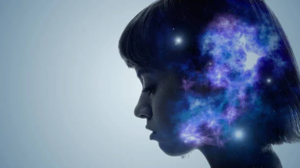Illustration of a head in profile filled with stars, representing mental wellbeing